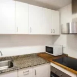 Bright student apartment living room in Carrer de Tordera Barcelona