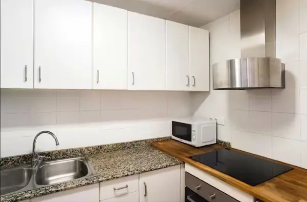 Bright student apartment living room in Carrer de Tordera Barcelona