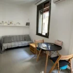 Bright student apartment in La Barceloneta Barcelona with balcony air conditioning and furnished interiors