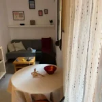 Bright student apartment in La Barceloneta Barcelona with balcony air conditioning and furnished interiors