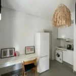 Bright student apartment in La Barceloneta Barcelona with balcony air conditioning and furnished interiors