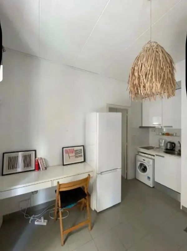 Bright student apartment in La Barceloneta Barcelona with balcony air conditioning and furnished interiors