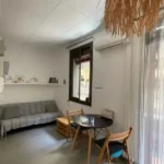 Bright student apartment in La Barceloneta Barcelona with balcony air conditioning and furnished interiors