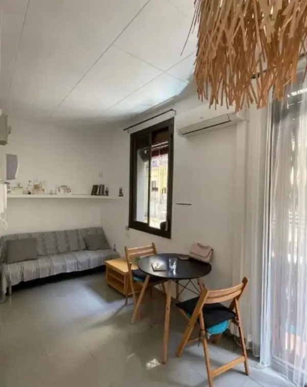 Bright student apartment in La Barceloneta Barcelona with balcony air conditioning and furnished interiors