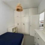 Bright student apartment in La Barceloneta Barcelona with balcony air conditioning and furnished interiors