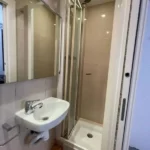 Bright student apartment in La Barceloneta Barcelona with balcony air conditioning and furnished interiors