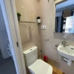 Bright student apartment in La Barceloneta Barcelona with balcony air conditioning and furnished interiors
