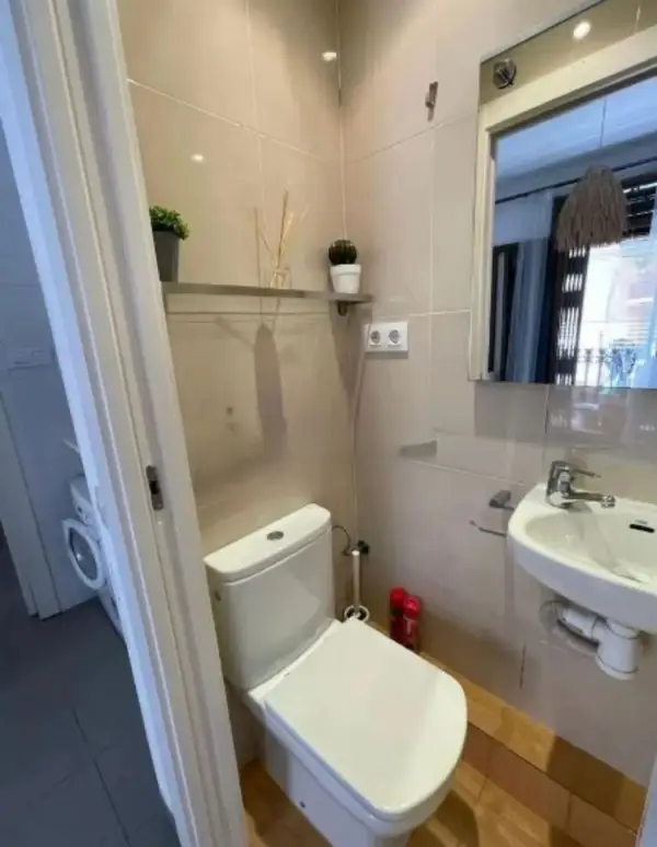 Bright student apartment in La Barceloneta Barcelona with balcony air conditioning and furnished interiors