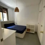 Bright student apartment in La Barceloneta Barcelona with balcony air conditioning and furnished interiors