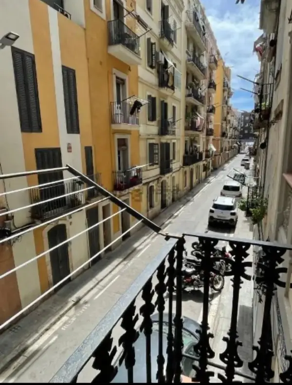 Bright student apartment in La Barceloneta Barcelona with balcony air conditioning and furnished interiors