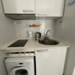 Bright student apartment in La Barceloneta Barcelona with balcony air conditioning and furnished interiors