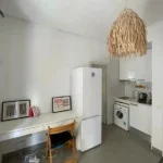 Bright student apartment in La Barceloneta Barcelona with balcony air conditioning and furnished interiors