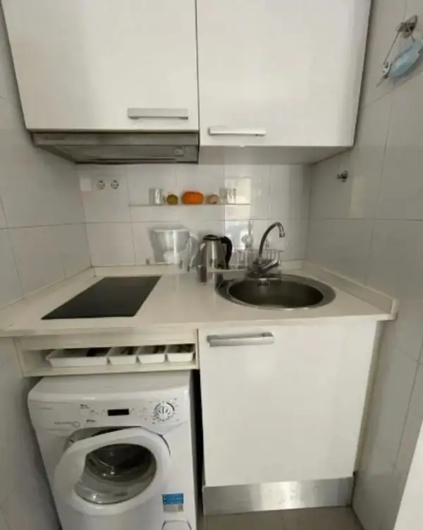 Bright student apartment in La Barceloneta Barcelona with balcony air conditioning and furnished interiors