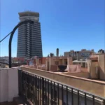 Bright penthouse apartment in Calle de Guàrdia Barcelona with large terrace balcony and furnished interiors