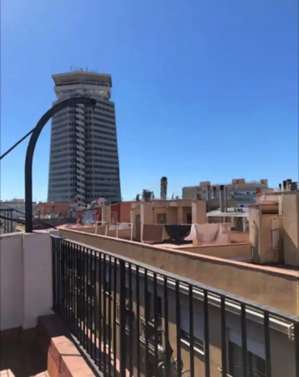 Bright penthouse apartment in Calle de Guàrdia Barcelona with large terrace balcony and furnished interiors