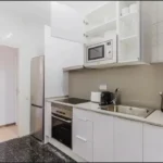 Modern student apartment in Calle de Sicília Barcelona with renovated interiors and air conditioning
