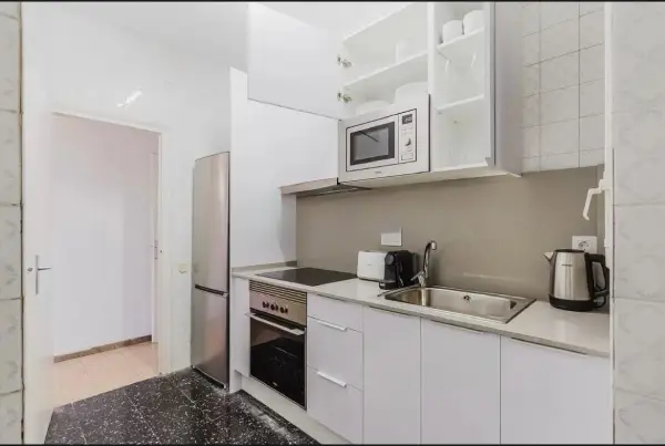 Modern student apartment in Calle de Sicília Barcelona with renovated interiors and air conditioning