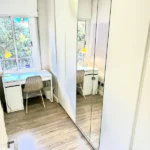 Bright student apartment in Les Corts Barcelona with balcony natural light and furnished interiors