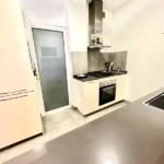 Bright student apartment in Les Corts Barcelona with balcony natural light and furnished interiors
