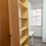 Furnished student room in Eixample Barcelona with private bathroom desk and built-in wardrobe