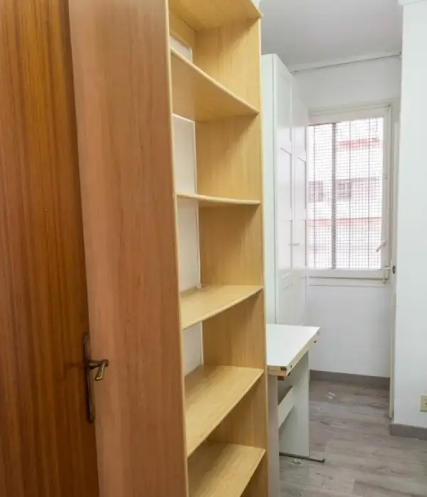 Furnished student room in Eixample Barcelona with private bathroom desk and built-in wardrobe