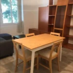 Furnished student room in Eixample Barcelona with private bathroom desk and built-in wardrobe