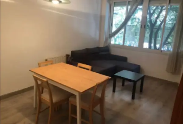Furnished student room in Eixample Barcelona with private bathroom desk and built-in wardrobe