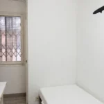 Furnished student room in Eixample Barcelona with private bathroom desk and built-in wardrobe