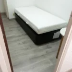 Furnished student room in Eixample Barcelona with private bathroom desk and built-in wardrobe