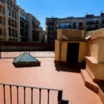 Modern student apartment in Calle d'Aribau Eixample Barcelona with terrace, two bedrooms, and furnished interiors