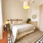 Modern student apartment in Calle d'Aribau Eixample Barcelona with terrace, two bedrooms, and furnished interiors