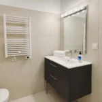 Modern student apartment in Calle d'Aribau Eixample Barcelona with terrace, two bedrooms, and furnished interiors