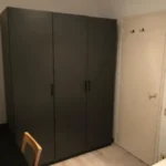 Furnished student room in Eixample Barcelona with private bathroom desk and built-in wardrobe
