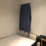 Furnished student room in Eixample Barcelona with private bathroom desk and built-in wardrobe