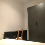 Furnished student room in Eixample Barcelona with private bathroom desk and built-in wardrobe