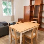 Furnished student room in Eixample Barcelona with private bathroom desk and built-in wardrobev