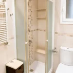 Furnished student room in Eixample Barcelona with private bathroom desk and built-in wardrobe