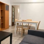 Furnished student room in Eixample Barcelona with private bathroom desk and built-in wardrobe