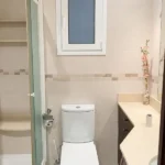 Furnished student room in Eixample Barcelona with private bathroom desk and built-in wardrobe