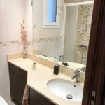 Furnished student room in Eixample Barcelona with private bathroom desk and built-in wardrobe