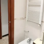 Furnished student room in Eixample Barcelona with private bathroom desk and built-in wardrobe
