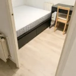 Furnished student room in Eixample Barcelona with private bathroom desk and built-in wardrobe