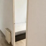 Furnished student room in Eixample Barcelona with private bathroom desk and built-in wardrobe