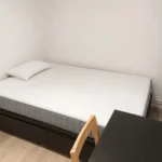 Furnished student room in Eixample Barcelona with private bathroom desk and built-in wardrobe