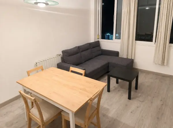Furnished student room in Eixample Barcelona with private bathroom desk and built-in wardrobe