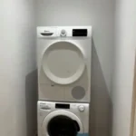 Bright student room in Eixample Barcelona with private bathroom, balcony, and double bed