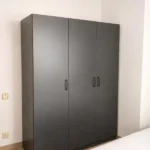 Furnished student room in Eixample Barcelona with private bathroom desk and built-in wardrobe