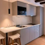 Modern one-bedroom apartment in Eixample Barcelona with private terrace, air conditioning, and fully equipped kitchen
