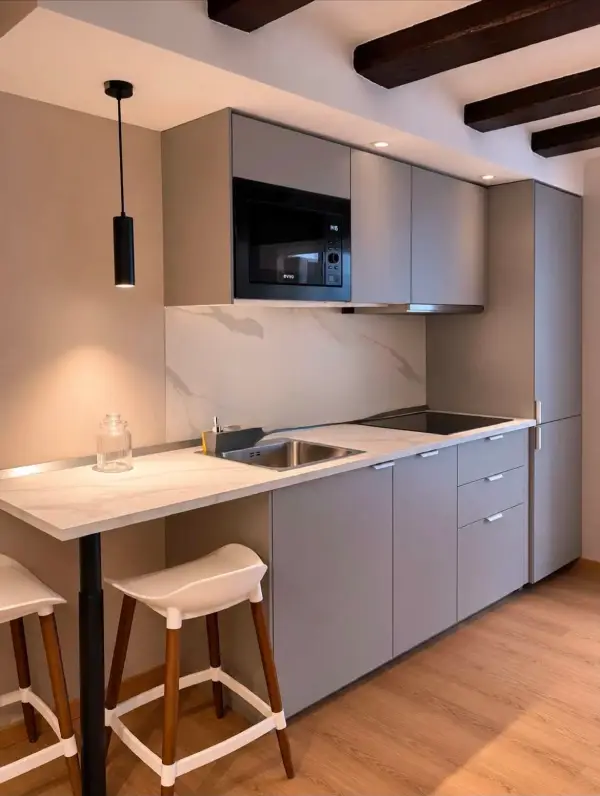 Modern one-bedroom apartment in Eixample Barcelona with private terrace, air conditioning, and fully equipped kitchen
