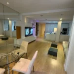 Modern student room in Eixample Barcelona with shared terrace, central AC and furnished apartment